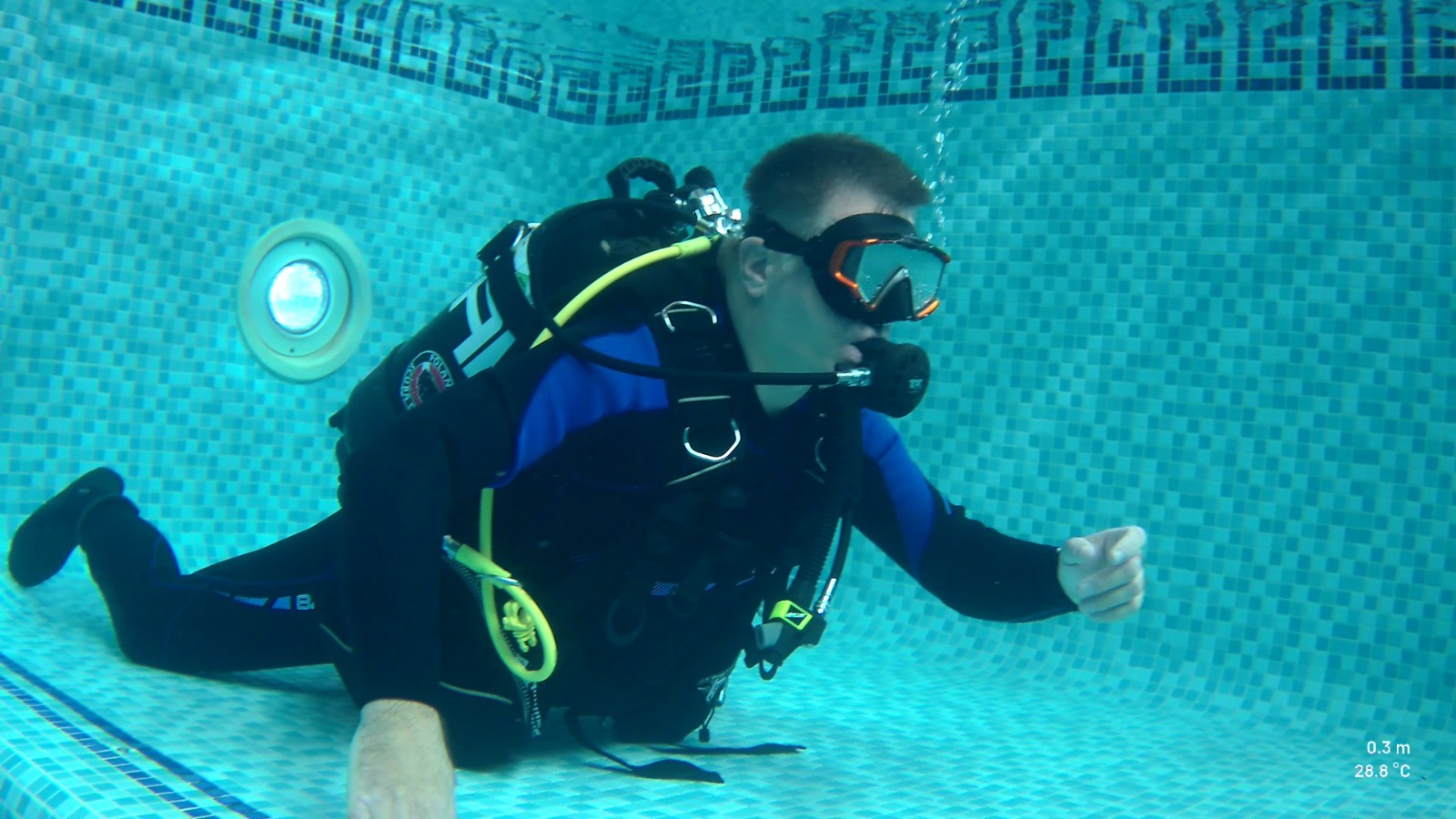 Diver working on buoyancy in the indoor training pool at Stoney Cove