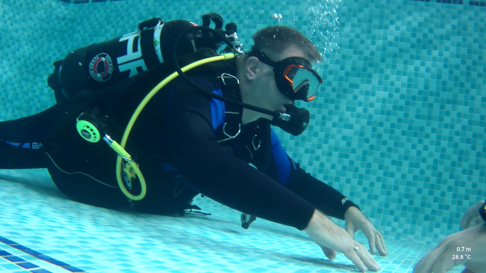 Diver in trim just above the bottom of the training pool at Stoney Cove